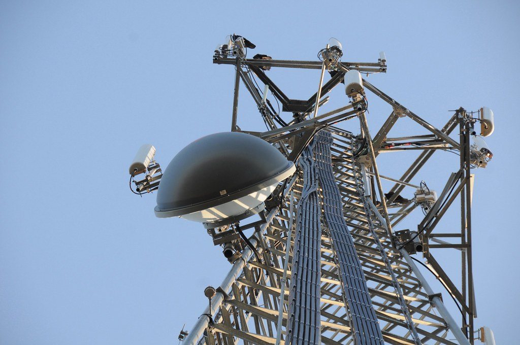 Lattice communications tower with antenna equipment