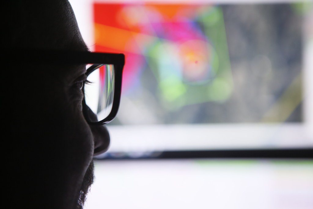Pilot reviewing a live drone feed on screen